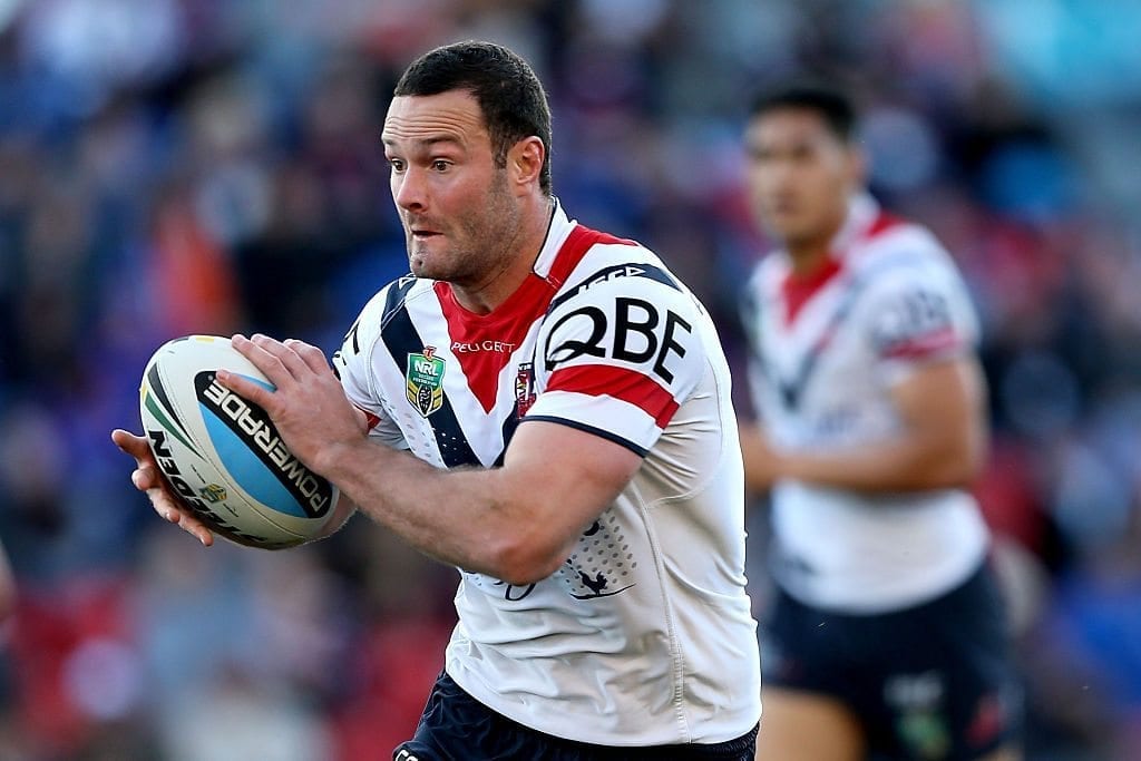 NEWCASTLE, AUSTRALIA - AUGUST 09: Boyd Cordner of the Roosters runs the ball during the round 22 NRL match between the Newcastle Knights and the Sydney Roosters at Hunter Stadium on August 9, 2015 in Newcastle, Australia. (Photo by Ashley Feder/Getty Images)