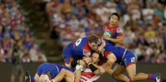 Sims not slowed by arm fracture