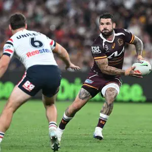 BRISBANE, AUSTRALIA - APRIL 11: Adam Reynolds of the Broncos passes during the round six NRL match between Brisbane Broncos and Sydney Roosters at Suncorp Stadium, on April 11, 2025, in Brisbane, Australia. (Photo by Bradley Kanaris/Getty Images)