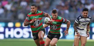 PERTH, AUSTRALIA - APRIL 12: Latrell Mitchell of the Rabbitohs runs the ball during the round six NRL match between South Sydney Rabbitohs and North Queensland Cowboys at Perth Stadium, on April 12, 2025, in Perth, Australia. (Photo by Paul Kane/Getty Images)