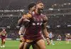 PERTH, AUSTRALIA - JUNE 18: Hamiso Tabuai-Fidow of the Maroons celebrates with team mates after scoring his second try during game two of the Men's State of Origin series between Queensland Maroons and New South Wales Blues at Optus Stadium on June 18, 2025 in Perth, Australia. (Photo by Cameron Spencer/Getty Images)