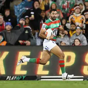 SYDNEY, AUSTRALIA - MAY 18: Alex Johnston of the Rabbitohs makes a break during the round eleven NRL match between Wests Tigers and Rabbitohs at Campbelltown Sports Stadium, on May 18, 2025, in Sydney, Australia. (Photo by Cameron Spencer/Getty Images)