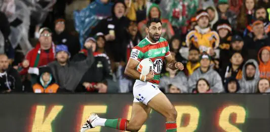 SYDNEY, AUSTRALIA - MAY 18: Alex Johnston of the Rabbitohs makes a break during the round eleven NRL match between Wests Tigers and Rabbitohs at Campbelltown Sports Stadium, on May 18, 2025, in Sydney, Australia. (Photo by Cameron Spencer/Getty Images)