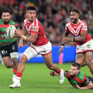 BRISBANE, AUSTRALIA - JUNE 28: Isaiya Katoa of the Dolphins breaks away from the defence during the round 17 NRL match between South Sydney Rabbitohs and Dolphins at Suncorp Stadium, on June 28, 2025, in Brisbane, Australia. (Photo by Bradley Kanaris/Getty Images)