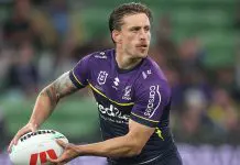 MELBOURNE, AUSTRALIA - MARCH 20: Cameron Munster of the Storm runs the ball during the round three NRL match between the Melbourne Storm and Penrith Panthers at AAMI Park on March 20, 2025, in Melbourne, Australia. (Photo by Daniel Pockett/Getty Images)