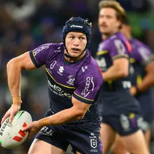 MELBOURNE, AUSTRALIA - JUNE 06: Harry Grant of the Storm passes the ball during the round 14 NRL match between Melbourne Storm and North Queensland Cowboys at AAMI Park, on June 06, 2025, in Melbourne, Australia. (Photo by Quinn Rooney/Getty Images)