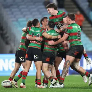 SYDNEY, AUSTRALIA - AUGUST 21: Thomas Fletcher of the Rabbitohs celebrates scoring a try with team mates during the round 25 NRL match between South Sydney Rabbitohs and Dolphins at Accor Stadium, on August 21, 2025, in Sydney, Australia. (Photo by Matt King/Getty Images)