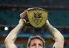 SYDNEY, AUSTRALIA - SEPTEMBER 30: Ryan Hoffman holds the NRL premiership trophy after the 2012 NRL Grand Final match between the Melbourne Storm and the Canterbury Bulldogs at ANZ Stadium on September 30, 2012 in Sydney, Australia.  (Photo by Mark Nolan/Getty Images)
