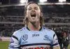 CANBERRA, AUSTRALIA - SEPTEMBER 20: Nicho Hynes of the Sharks celebrates winning the NRL Semi Final match between the Canberra Raiders and Cronulla Sharks at GIO Stadium on September 20, 2025, in Canberra, Australia. (Photo by Darrian Traynor/Getty Images)