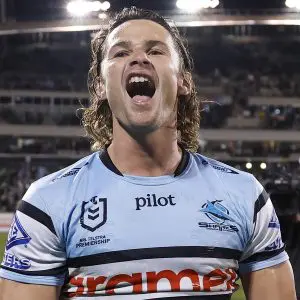 CANBERRA, AUSTRALIA - SEPTEMBER 20: Nicho Hynes of the Sharks celebrates winning the NRL Semi Final match between the Canberra Raiders and Cronulla Sharks at GIO Stadium on September 20, 2025, in Canberra, Australia. (Photo by Darrian Traynor/Getty Images)