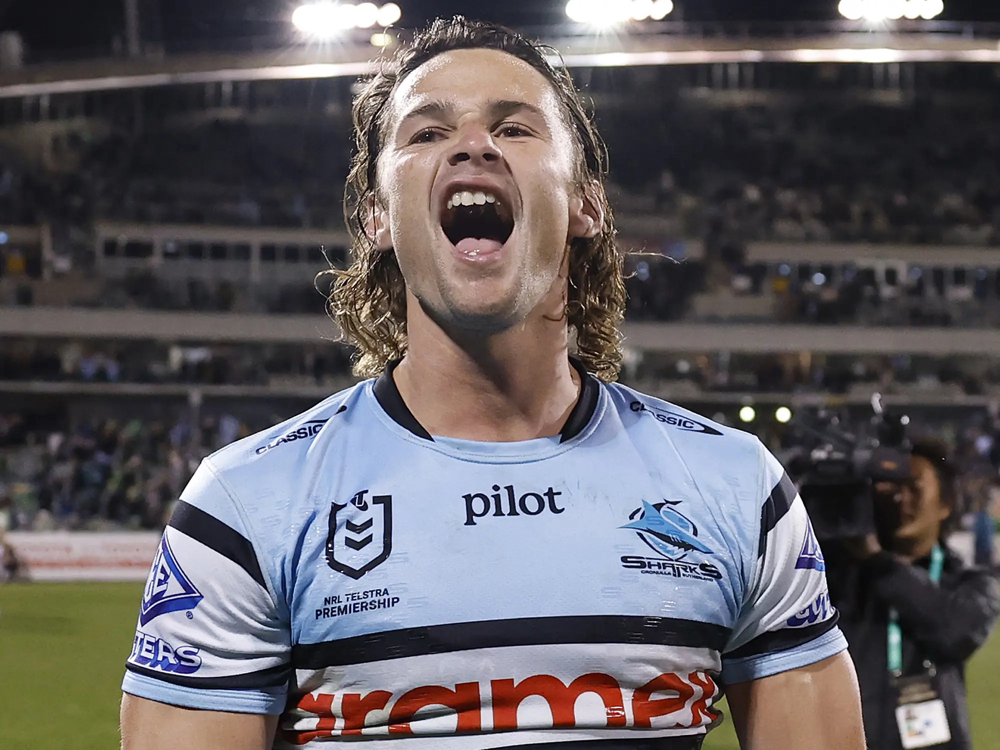 CANBERRA, AUSTRALIA - SEPTEMBER 20: Nicho Hynes of the Sharks celebrates winning the NRL Semi Final match between the Canberra Raiders and Cronulla Sharks at GIO Stadium on September 20, 2025, in Canberra, Australia. (Photo by Darrian Traynor/Getty Images)