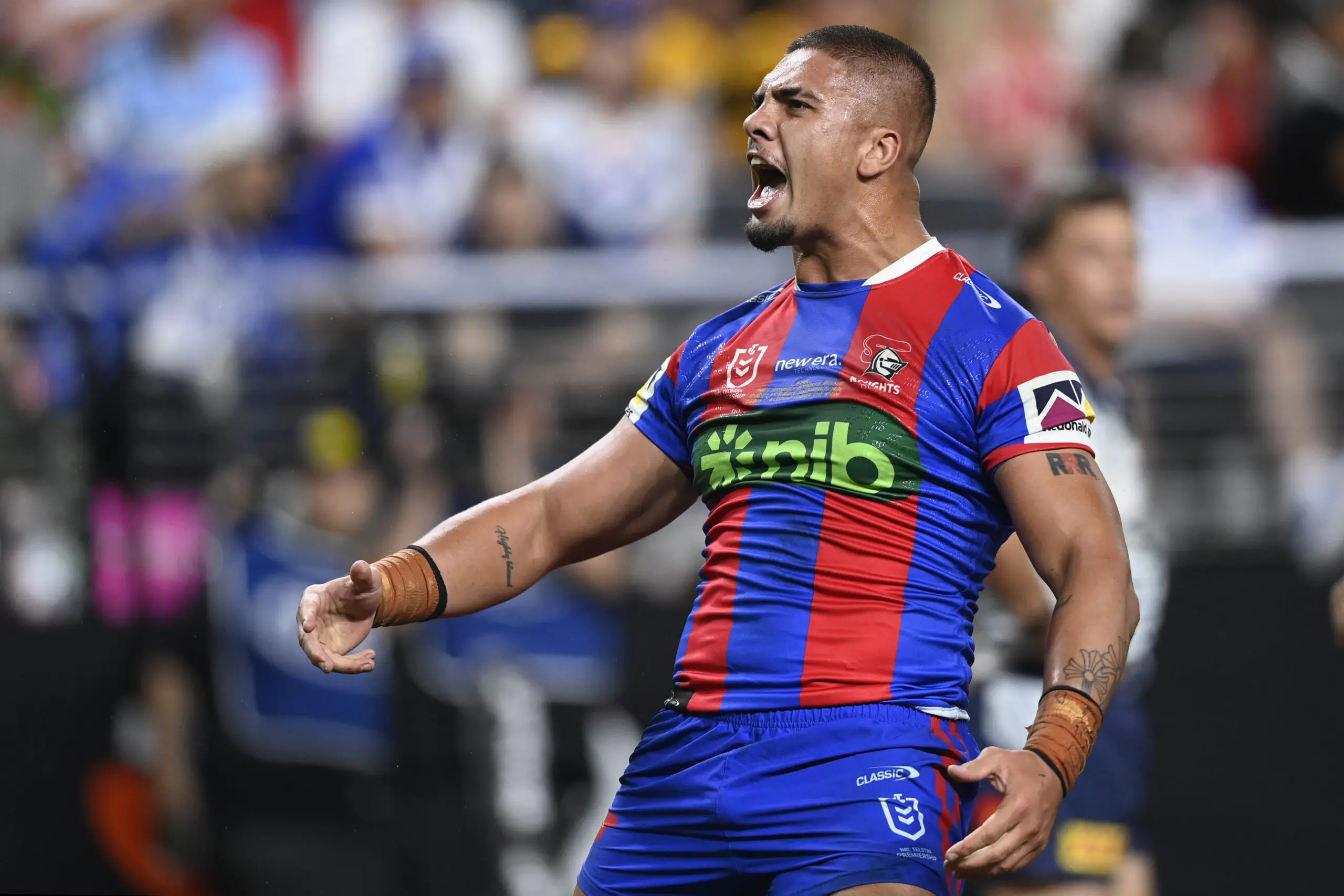 LAS VEGAS, NEVADA - FEBRUARY 28: Trey Mooney of the Knights celebrates scoring a try during the round one NRL match between Newcastle Knights and North Queensland Cowboys at Allegiant Stadium on February 28, 2026 in Las Vegas, Nevada. (Photo by Ian Hitchcock/Getty Images)
