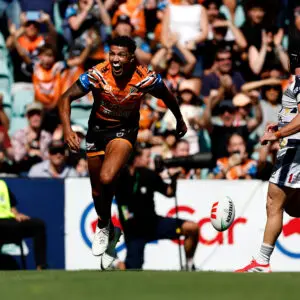 SYDNEY, AUSTRALIA - MARCH 14: Kai Pearce-Paul of the Tigers celebrates scoring a try during the round two NRL match between Wests Tigers and North Queensland Cowboys at Leichhardt Oval, on March 14, 2026, in Sydney, Australia. (Photo by Brendon Thorne/Getty Images)