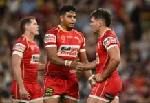 BRISBANE, AUSTRALIA - MARCH 27: Jake Averillo of the Dolphins celebrates with Selwyn Cobbo after scoring a try during the round four NRL match between Brisbane Broncos and Dolphins at Suncorp Stadium, on March 27, 2026, in Brisbane, Australia. (Photo by Albert Perez/Getty Images)