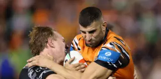 SYDNEY, AUSTRALIA - APRIL 23: Alex Twal of the Wests Tigers is tackled during the round eight NRL match between the Wests Tigers and Canberra Raiders at Leichhardt Oval on April 23, 2026 in Sydney, Australia. (Photo by Cameron Spencer/Getty Images)