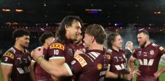SYDNEY, AUSTRALIA - JULY 09: Tino Fa'asuamaleaui and Harry Grant of the Maroons celebrate winning game three of the Men's State Of Origin series between New South Wales Blues and Queensland Maroons at Accor Stadium on July 09, 2025 in Sydney, Australia. (Photo by Cameron Spencer/Getty Images)