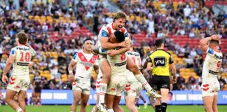 BRISBANE, AUSTRALIA - MAY 31: Ryan Couchman and Loko Jnr Pasifiki Tonga of the Dragons and team mates celebrate victory after the round 13 NRL match between Brisbane Broncos and St George Illawarra Dragons at Suncorp Stadium, on May 31, 2026, in Brisbane, Australia. (Photo by Bradley Kanaris/Getty Images)