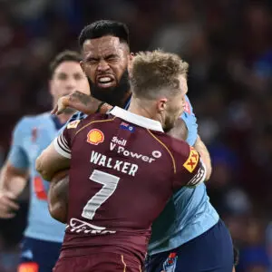 BRISBANE, AUSTRALIA - JULY 08: Payne Haas of the Blues is tackled during game three of the Men's State of Origin series between the Queensland Maroons and the New South Wales Blues at Suncorp Stadium on July 08, 2026 in Brisbane, Australia. (Photo by Bradley Kanaris/Getty Images)