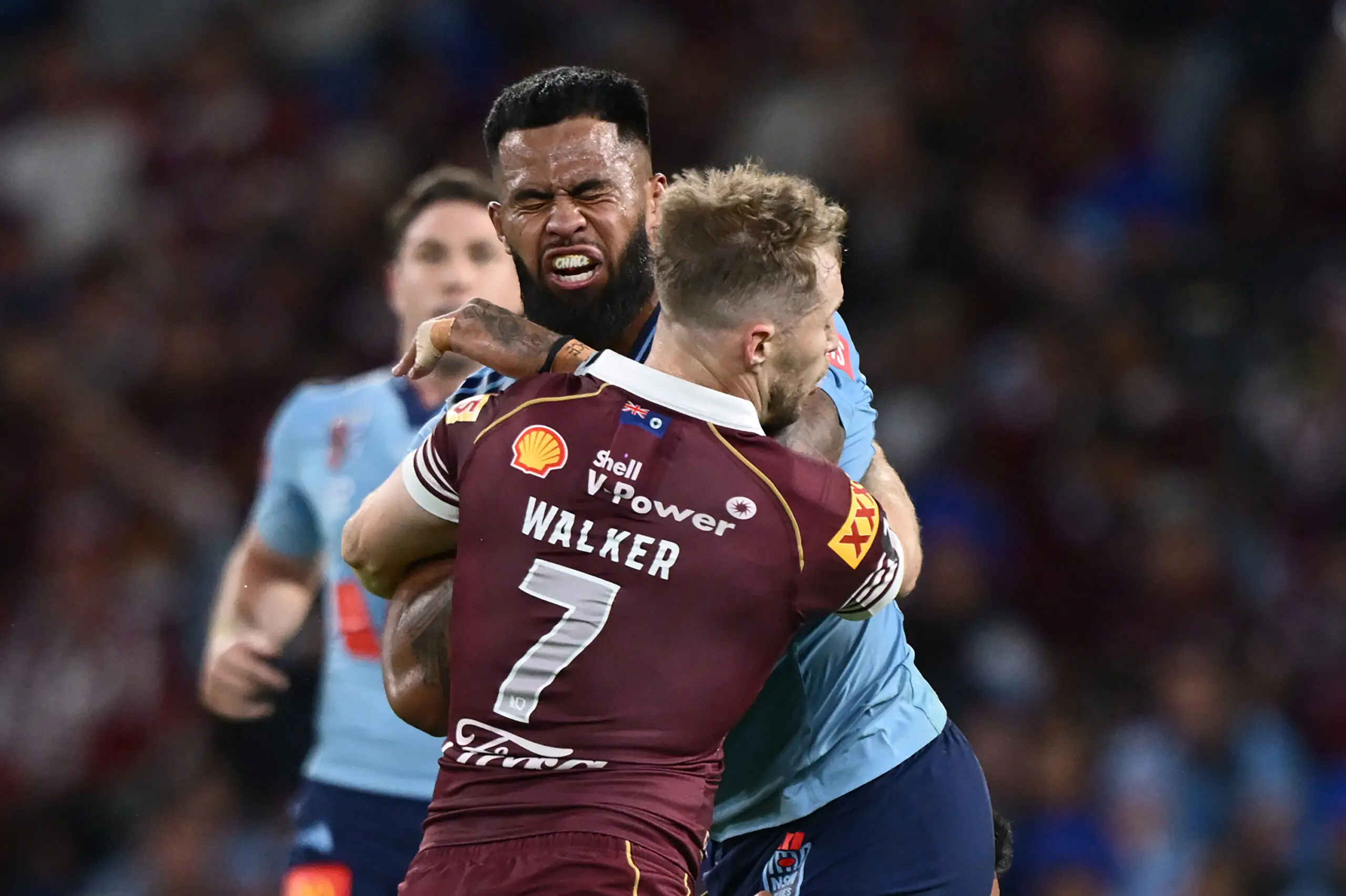BRISBANE, AUSTRALIA - JULY 08: Payne Haas of the Blues is tackled during game three of the Men's State of Origin series between the Queensland Maroons and the New South Wales Blues at Suncorp Stadium on July 08, 2026 in Brisbane, Australia. (Photo by Bradley Kanaris/Getty Images)