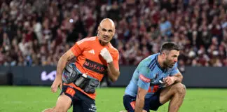 BRISBANE, AUSTRALIA - JULY 08: James Tedesco of the Blues looks on after a head clash with Briton Nikora of the Maroons during game three of the Men's State of Origin series between the Queensland Maroons and the New South Wales Blues at Suncorp Stadium on July 08, 2026 in Brisbane, Australia. (Photo by Bradley Kanaris/Getty Images)