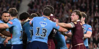 BRISBANE, AUSTRALIA - JULY 08: Isaah Yeo of the Blues scuffles with Cameron Munster of the Maroons during game three of the Men's State of Origin series between the Queensland Maroons and the New South Wales Blues at Suncorp Stadium on July 08, 2026 in Brisbane, Australia. (Photo by Bradley Kanaris/Getty Images)