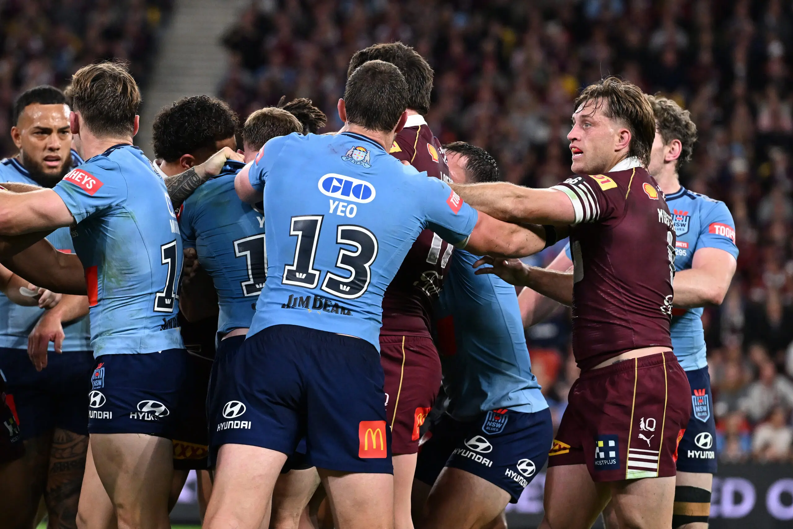 BRISBANE, AUSTRALIA - JULY 08: Isaah Yeo of the Blues scuffles with Cameron Munster of the Maroons during game three of the Men's State of Origin series between the Queensland Maroons and the New South Wales Blues at Suncorp Stadium on July 08, 2026 in Brisbane, Australia. (Photo by Bradley Kanaris/Getty Images)