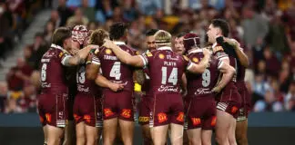 BRISBANE, AUSTRALIA - JULY 08: Maroons players huddle during game three of the Men's State of Origin series between the Queensland Maroons and the New South Wales Blues at Suncorp Stadium on July 08, 2026 in Brisbane, Australia. (Photo by Chris Hyde/Getty Images)