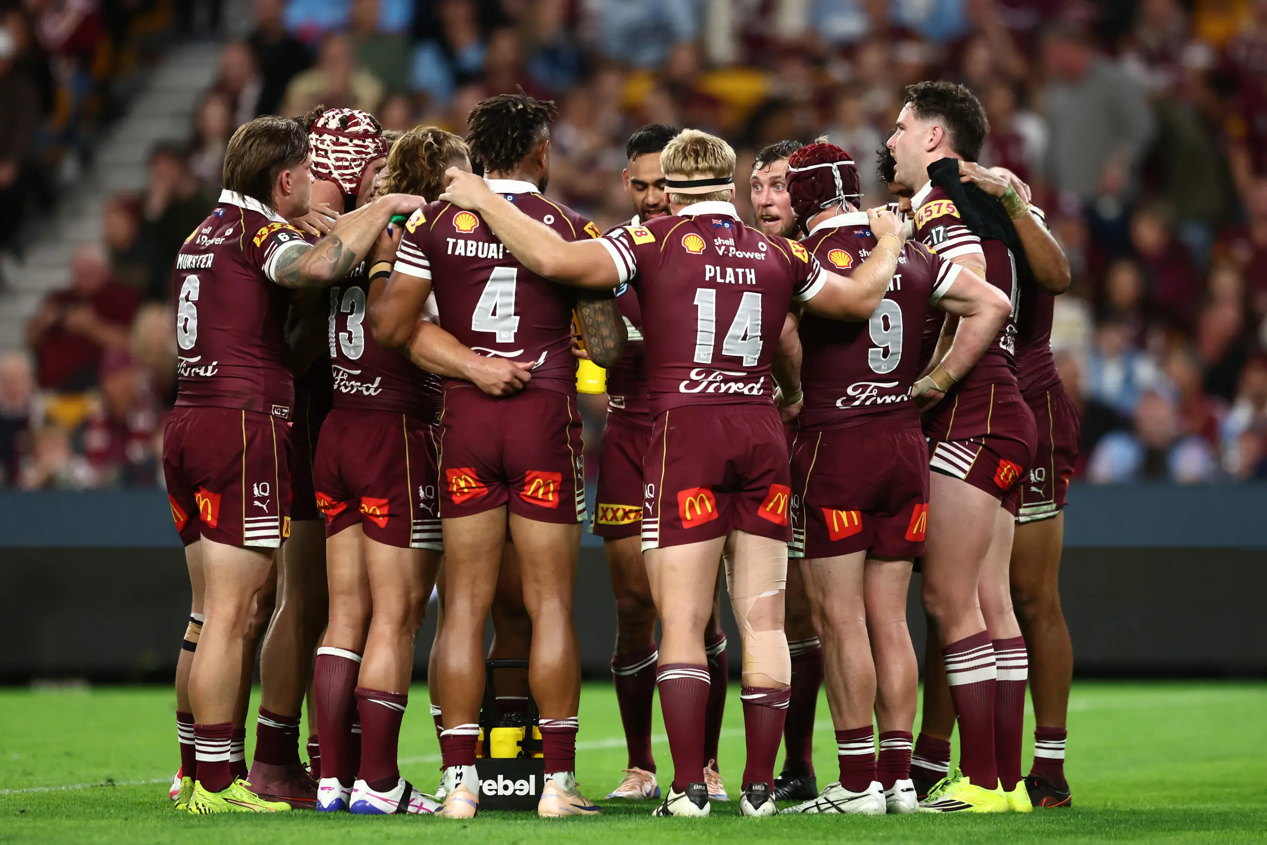 BRISBANE, AUSTRALIA - JULY 08: Maroons players huddle during game three of the Men's State of Origin series between the Queensland Maroons and the New South Wales Blues at Suncorp Stadium on July 08, 2026 in Brisbane, Australia. (Photo by Chris Hyde/Getty Images)