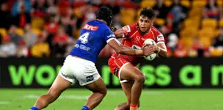 BRISBANE, AUSTRALIA - MAY 07: Selwyn Cobbo of the Dolphins takes on the defence of Stephen Crichton of the Bulldogs during the round 10 NRL match between Dolphins and Canterbury Bulldogs at Suncorp Stadium, on May 07, 2026, in Brisbane, Australia. (Photo by Bradley Kanaris/Getty Images)