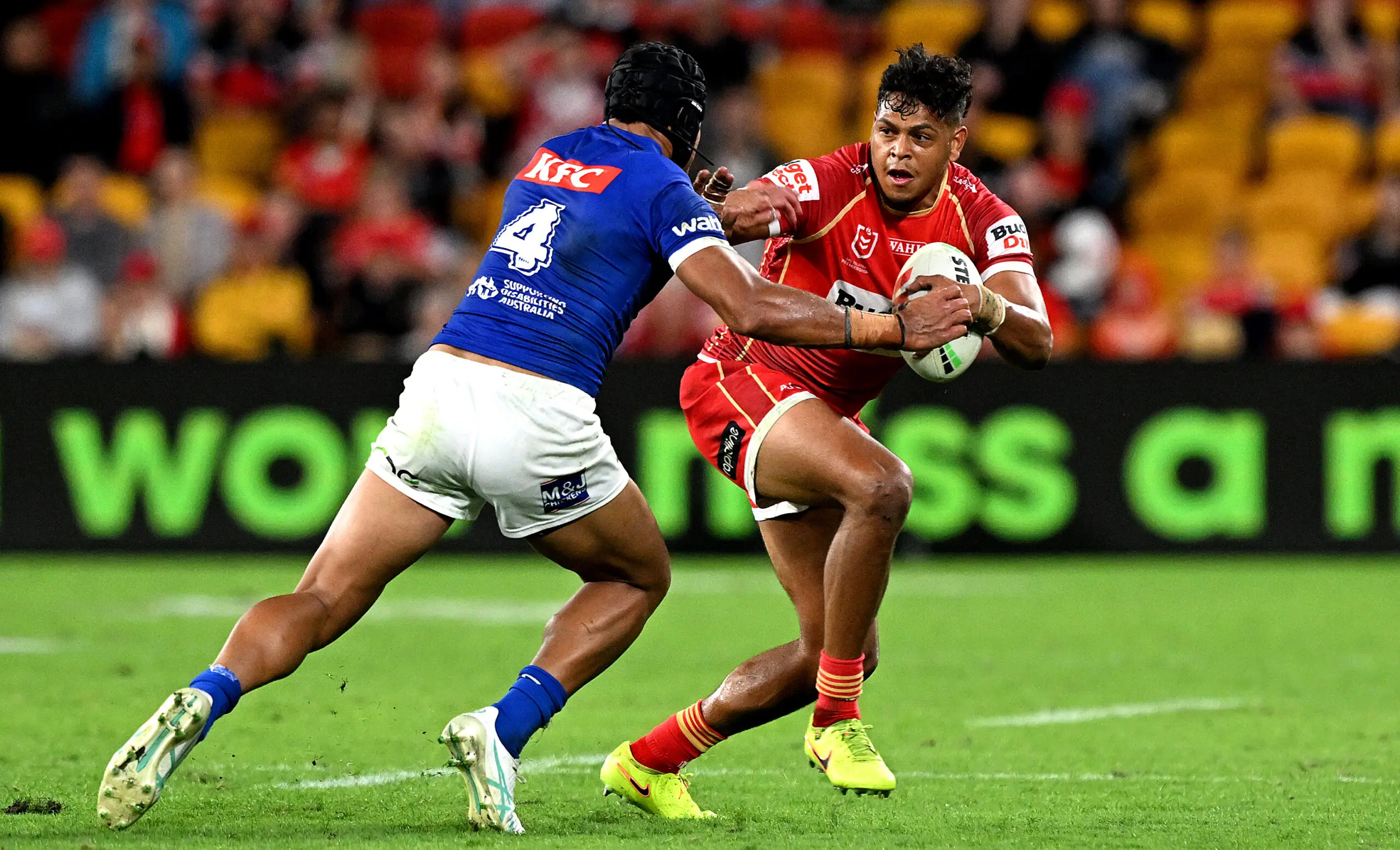 BRISBANE, AUSTRALIA - MAY 07: Selwyn Cobbo of the Dolphins takes on the defence of Stephen Crichton of the Bulldogs during the round 10 NRL match between Dolphins and Canterbury Bulldogs at Suncorp Stadium, on May 07, 2026, in Brisbane, Australia. (Photo by Bradley Kanaris/Getty Images)