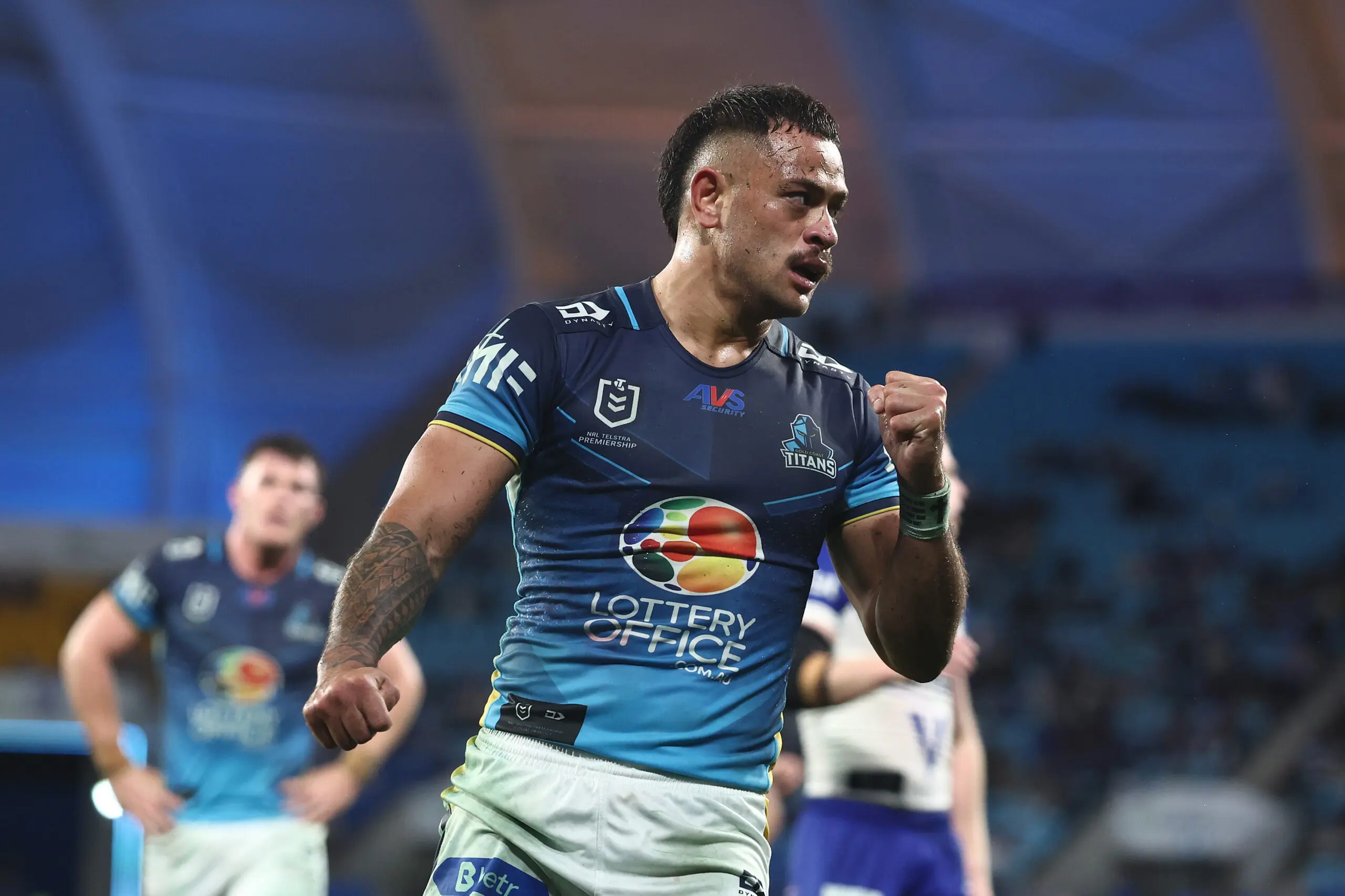 GOLD COAST, AUSTRALIA - JUNE 26: Phillip Sami of the Titans celebrates a try during the round 17 NRL match between Gold Coast Titans and Canterbury Bulldogs at Cbus Super Stadium, on June 26, 2026, in Gold Coast, Australia. (Photo by Chris Hyde/Getty Images)