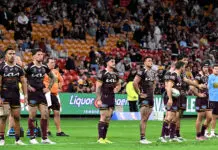 BRISBANE, AUSTRALIA - JULY 04: The Broncos player look dejected after a try by Braydon Trindall of the Sharks during the round 18 NRL match between Brisbane Broncos and Cronulla Sharks at Suncorp Stadium, on July 04, 2026, in Brisbane, Australia. (Photo by Bradley Kanaris/Getty Images)