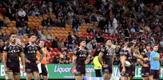 BRISBANE, AUSTRALIA - JULY 04: The Broncos player look dejected after a try by Braydon Trindall of the Sharks during the round 18 NRL match between Brisbane Broncos and Cronulla Sharks at Suncorp Stadium, on July 04, 2026, in Brisbane, Australia. (Photo by Bradley Kanaris/Getty Images)