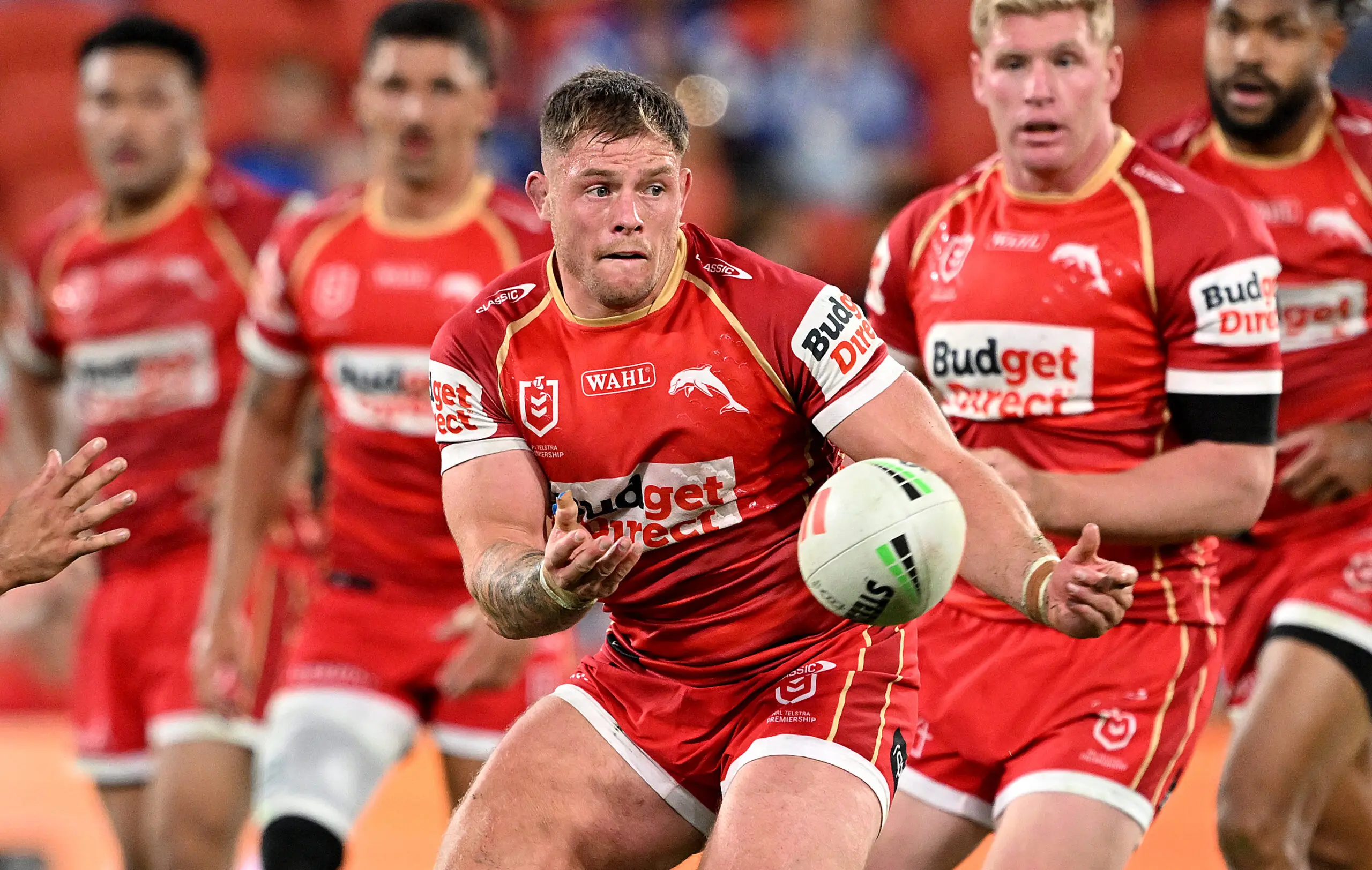 BRISBANE, AUSTRALIA - MAY 07: Morgan Knowles of the Dolphins passes the ball during the round 10 NRL match between Dolphins and Canterbury Bulldogs at Suncorp Stadium, on May 07, 2026, in Brisbane, Australia. (Photo by Bradley Kanaris/Getty Images)