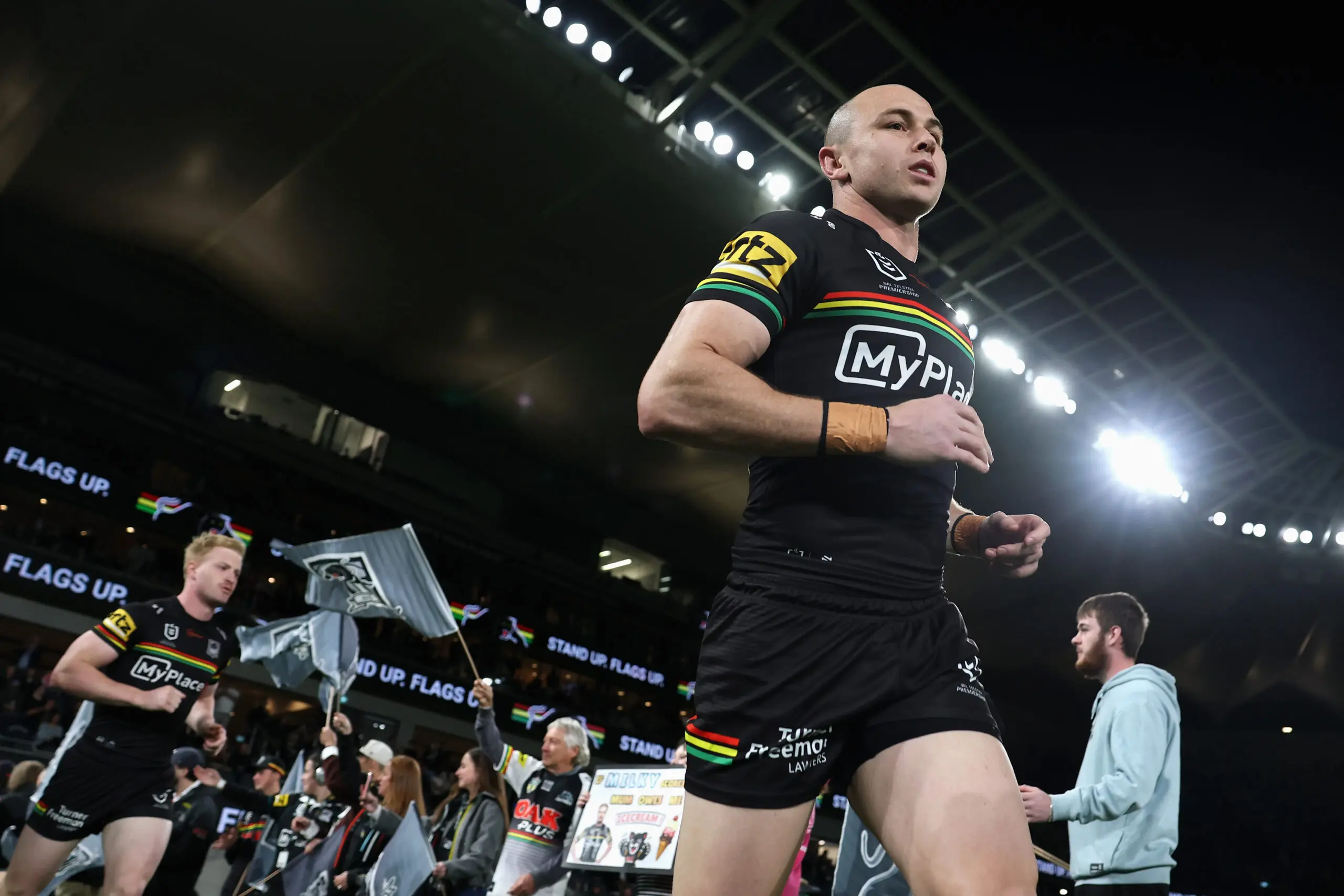 SYDNEY, AUSTRALIA - MAY 31: Dylan Edwards of the Panthers leads team mates onto the field during the round 13 NRL match between Penrith Panthers and New Zealand Warriors at CommBank Stadium, on May 31, 2026, in Sydney, Australia. (Photo by Cameron Spencer/Getty Images)