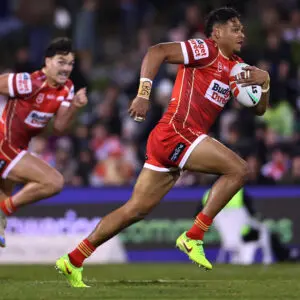 WOLLONGONG, AUSTRALIA - JULY 31: Selwyn Cobbo of the Dolphins makes a break and scores a try during the round 22 NRL match between St George Illawarra Dragons and Dolphins at WIN Stadium, on July 31, 2026, in Wollongong, Australia. (Photo by Jeremy Ng/Getty Images)