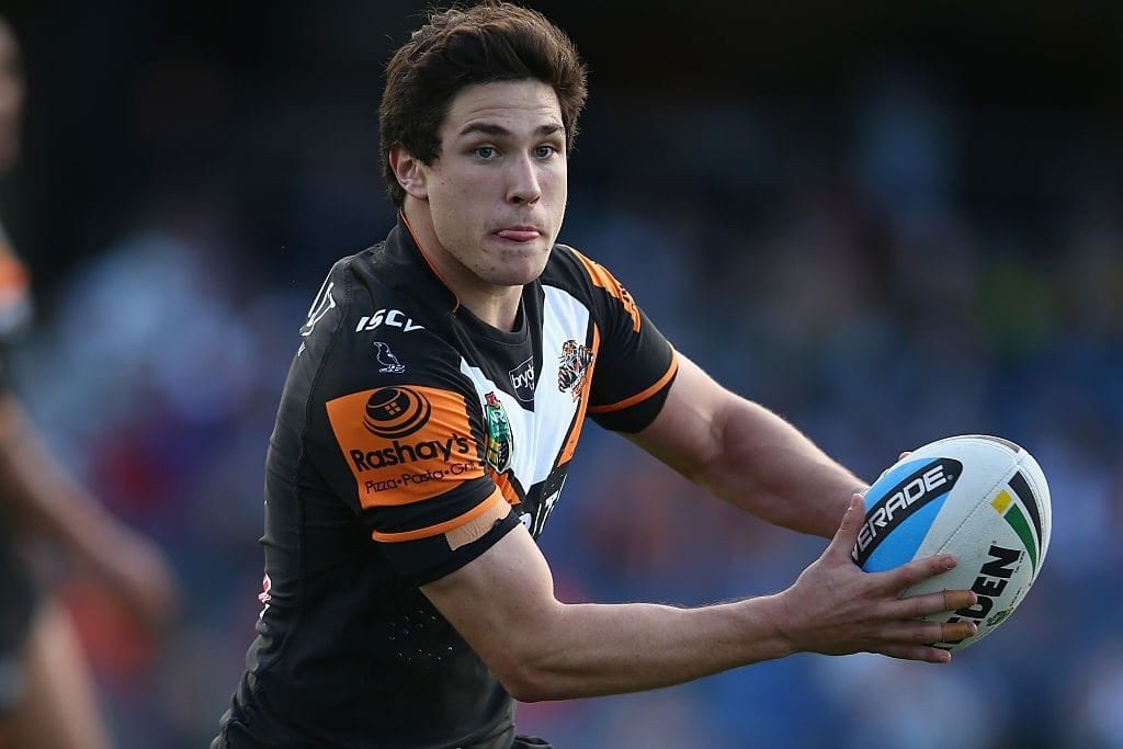 SYDNEY, AUSTRALIA - AUGUST 30: Mitchell Moses of the Wests Tigers runs the ball during the round 25 NRL match between the Wests Tigers and the New Zealand Warriors at Campbelltown Sports Stadium on August 30, 2015 in Sydney, Australia. (Photo by Mark Kolbe/Getty Images)