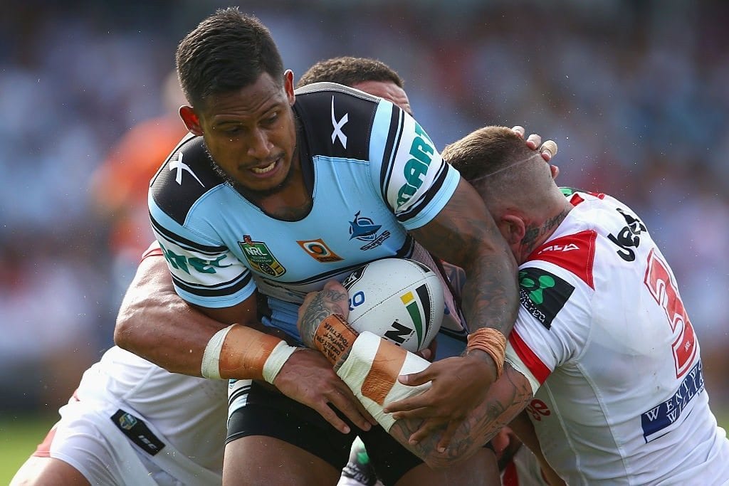 SYDNEY, AUSTRALIA - MARCH 13: Ben Barba of the Sharks is tackled during the round two NRL match between the Cronulla Sharks and the St George Illawarra Dragons at Shark Park on March 13, 2016 in Sydney, Australia. (Photo by Mark Kolbe/Getty Images)