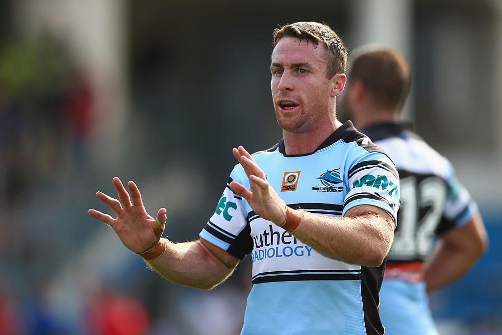 SYDNEY, AUSTRALIA - MARCH 13: James Maloney of the Sharks gives his team instructions during the round two NRL match between the Cronulla Sharks and the St George Illawarra Dragons at Shark Park on March 13, 2016 in Sydney, Australia. (Photo by Mark Kolbe/Getty Images)