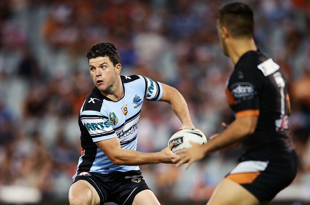 SYDNEY, NEW SOUTH WALES - APRIL 02: Chad Townsend of the Sharks runs with the ball during the round five NRL match between the Wests Tigers and the Cronulla Sharks at Campbelltown Sports Stadium on April 2, 2016 in Sydney, Australia. (Photo by Matt King/Getty Images)