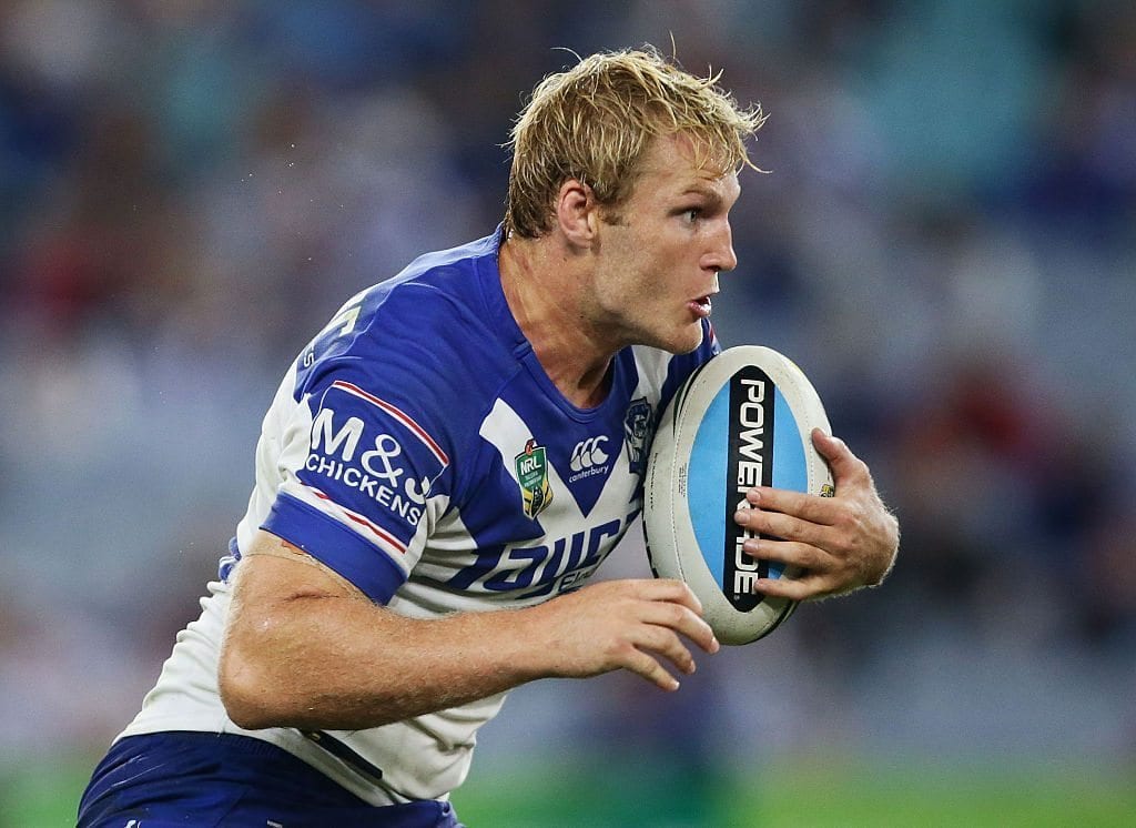 SYDNEY, AUSTRALIA - APRIL 17: Aiden Tolman of the Bulldogs runs with the ball during the round seven NRL match between the Canterbury Bulldogs and the Manly Warringah Sea Eagles at ANZ Stadium on April 17, 2015 in Sydney, Australia. (Photo by Matt King/Getty Images)