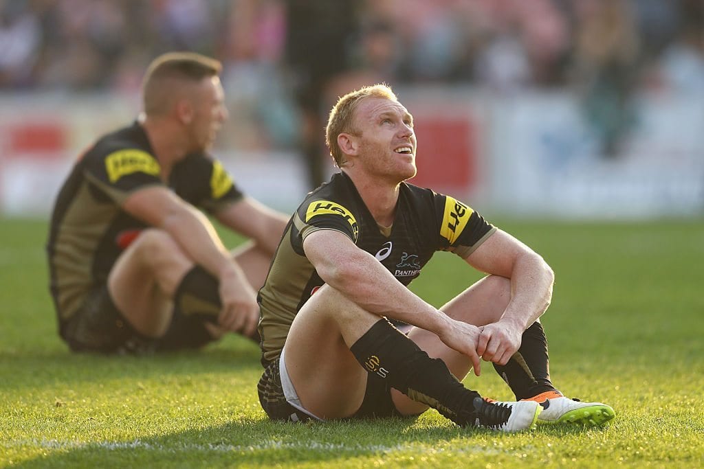 SYDNEY, AUSTRALIA - MAY 22: Bryce Cartwright and Peter Wallace of the Panthers looks dejected after defeat during the round 11 NRL match between the Penrith Panthers and the Gold Coast Titans at Pepper Stadium on May 22, 2016 in Sydney, Australia. (Photo by Mark Kolbe/Getty Images)