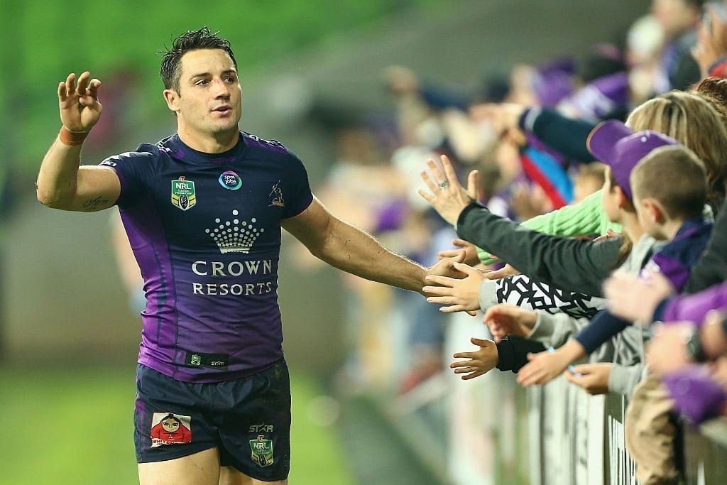 MELBOURNE, AUSTRALIA - JUNE 04: Cooper Cronk of the Storm thanks fans after a win during the round 13 NRL match between the Melbourne Storm and the Penrith Panthers at AAMI Park on June 4, 2016 in Melbourne, Australia. (Photo by Robert Prezioso/Getty Images)