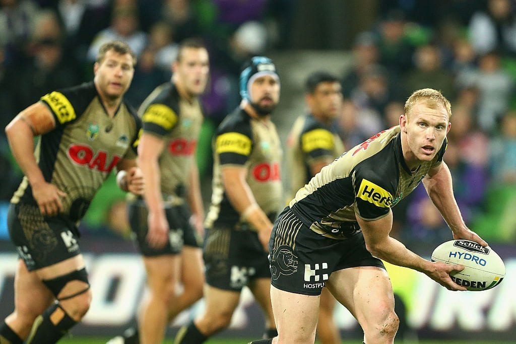 MELBOURNE, AUSTRALIA - JUNE 04: Peter Wallace of the Panthers offloads the ball during the round 13 NRL match between the Melbourne Storm and the Penrith Panthers at AAMI Park on June 4, 2016 in Melbourne, Australia. (Photo by Robert Prezioso/Getty Images)