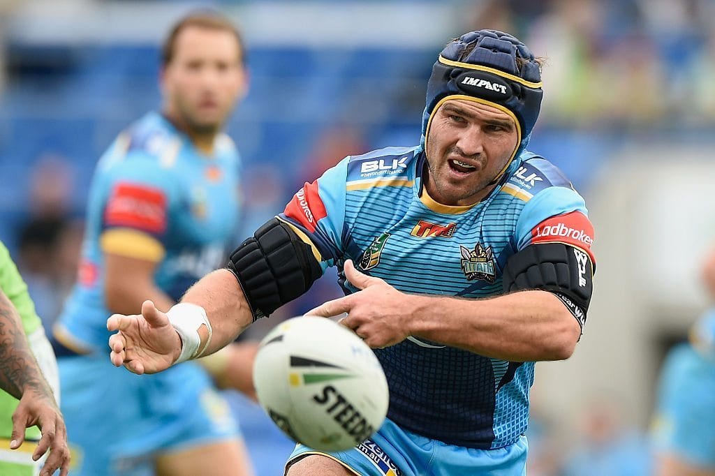 GOLD COAST, AUSTRALIA - JUNE 26: Nathan Friend of the Titans passes the ball during the round 16 NRL match between the Gold Coast Titans and the Canberra Raiders at Cbus Super Stadium on June 26, 2016 in Gold Coast, Australia. (Photo by Matt Roberts/Getty Images)