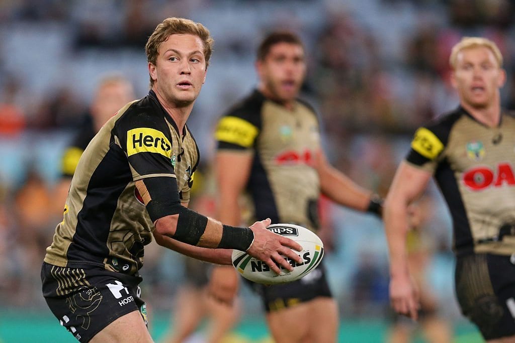 SYDNEY, AUSTRALIA - JULY 02: Matt Moylan of the Panthers looks to pass during the round 17 NRL match between the Wests Tigers and the Penrith Panthers at ANZ Stadium on July 2, 2016 in Sydney, Australia. (Photo by Jason McCawley/Getty Images)