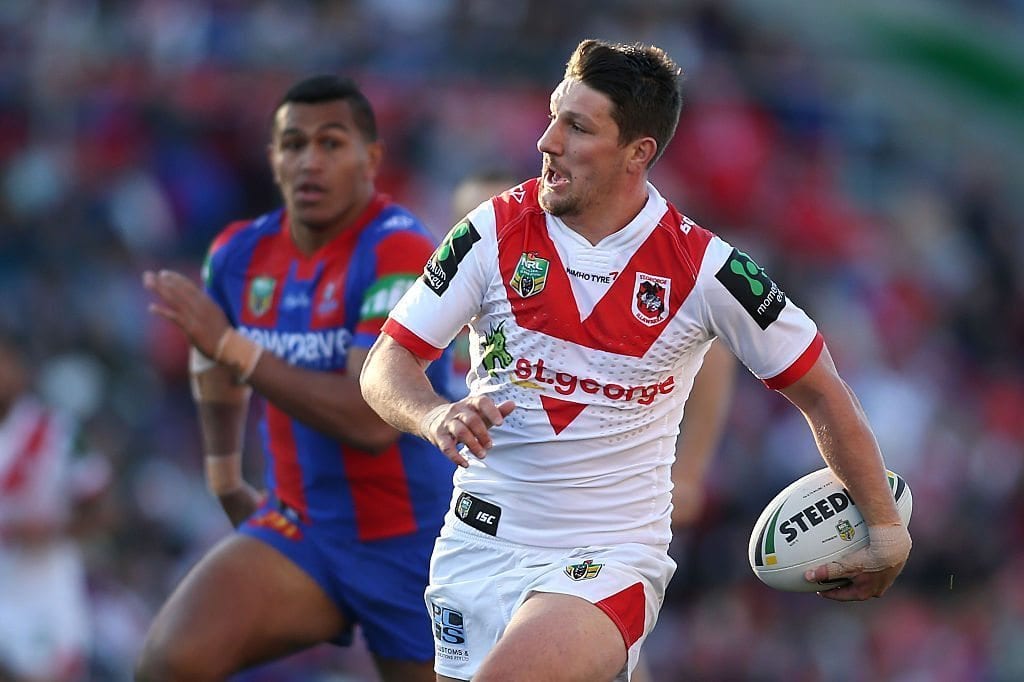 NEWCASTLE, AUSTRALIA - JUNE 25: Gareth Widdop of the Dragons runs the ball during the round 16 NRL match between the Newcastle Knights and the St George Illawarra Dragons at Hunter Stadium on June 25, 2016 in Newcastle, Australia. (Photo by Tony Feder/Getty Images)