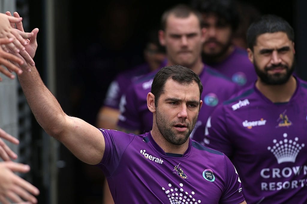 NEWCASTLE, AUSTRALIA - JULY 17: Cameron Smith of the Storm walks out to warm up before the start of the game during the round 19 NRL match between the Newcastle Knights and the Melbourne Storm at Hunter Stadium on July 17, 2016 in Newcastle, Australia. (Photo by Tony Feder/Getty Images)