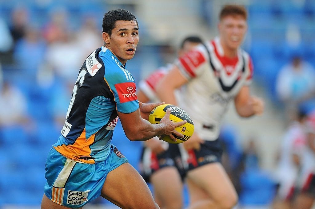 GOLD COAST, AUSTRALIA - APRIL 07: Jamal Fogarty of the Titans looks to pass during the round six Toyota Cup match between the Gold Coast Titans and the Sydney Roosters at Skilled Park on April 7, 2012 on the Gold Coast, Australia. (Photo by Matt Roberts/Getty Images)