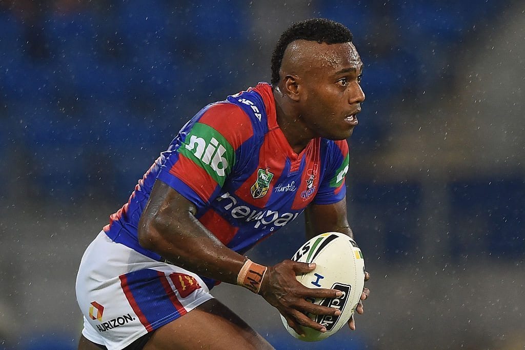GOLD COAST, AUSTRALIA - MARCH 06: Akuila Uate of the Knights runs with the ball during the round one NRL match between the Gold Coast Titans and the Newcastle Knights at Cbus Super Stadium on March 6, 2016 on the Gold Coast, Australia. (Photo by Matt Roberts/Getty Images)
